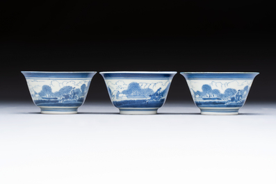 Three Japanese Arita blue and white &lsquo;Van Frytom&rsquo; cups and four shield-shaped saucers, Ming and Chenghua mark, ca. 1700