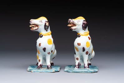 A pair of polychrome Dutch Delft models of dogs, 18th C.