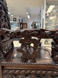 A richly carved Chinese hongmu 'dragon' armchair, Canton, 19th C.