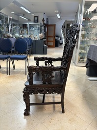 A richly carved Chinese hongmu 'dragon' armchair, Canton, 19th C.