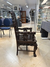 A richly carved Chinese hongmu 'dragon' armchair, Canton, 19th C.