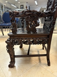A richly carved Chinese hongmu 'dragon' armchair, Canton, 19th C.