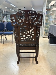 A richly carved Chinese hongmu 'dragon' armchair, Canton, 19th C.