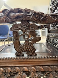 A richly carved Chinese hongmu 'dragon' armchair, Canton, 19th C.