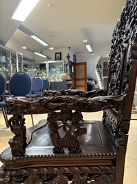 A richly carved Chinese hongmu 'dragon' armchair, Canton, 19th C.