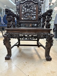 A richly carved Chinese hongmu 'dragon' armchair, Canton, 19th C.