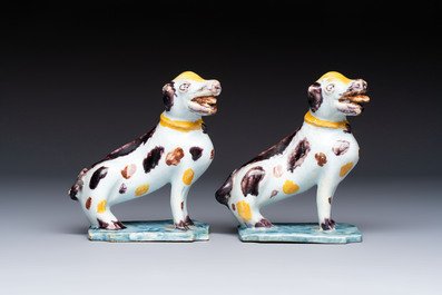 A pair of polychrome Dutch Delft models of dogs, 18th C.