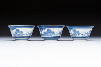 Three Japanese Arita blue and white &lsquo;Van Frytom&rsquo; cups and four shield-shaped saucers, Ming and Chenghua mark, ca. 1700