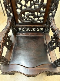 A richly carved Chinese hongmu 'dragon' armchair, Canton, 19th C.