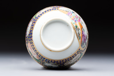 A Chinese famille rose gilt-decorated cup and saucer with figural design, Jiaqing
