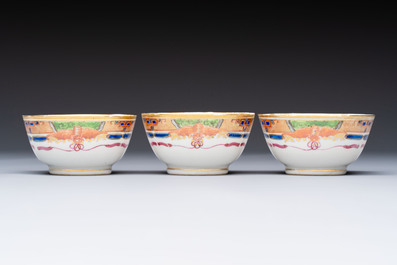 Three sets of Chinese famille rose gilt-decorated 'Bird among Flowering Branches' cups and saucers, 19th C.