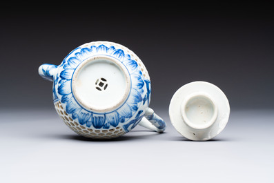 A rare Chinese blue and white reticulated double-walled ewer and cover with floral design, Kangxi