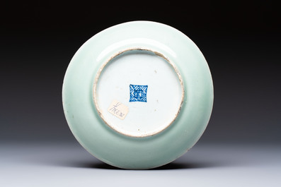 A Chinese famille verte 'Erotic Subject' plate, 19th C.