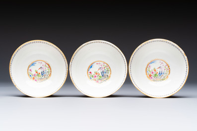 Three sets of Chinese famille rose gilt-decorated 'Bird among Flowering Branches' cups and saucers, 19th C.