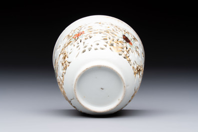 A pair of Chinese famille rose gilt-decorated covered cups and saucers and an openworked cup, Qianlong