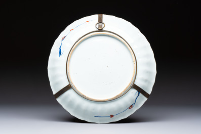 Two Chinese Imari-style plates and a dish with figural design, Kangxi