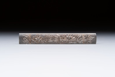 A varied group of six Japanese koshirae components or sword fittings, Edo