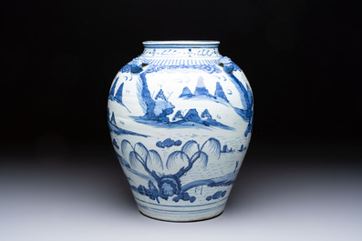 A Chinese blue and white 'Mountainous Landscape' vase with four lion-form handles, 16/17th C.