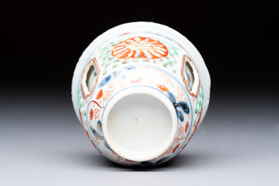 A rare Chinese famille verte reticulated double-walled cup and saucer, artemisia leaf mark, Kangxi
