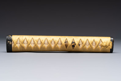 A varied group of six Japanese koshirae components or sword fittings, Edo