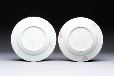 A pair of Chinese famille rose 'He He Er Xian' plates, Yongzheng/Qianlong