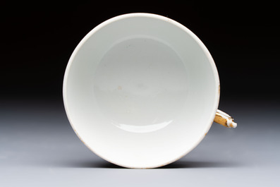 A Chinese famille rose puce-enamelled 'Riverscape' plate, cup and saucer, Jiaqing