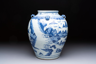 A Chinese blue and white 'Mountainous Landscape' vase with four lion-form handles, 16/17th C.