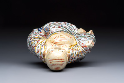 A polychrome Dutch Delft 'Budai' figure, 19th C.