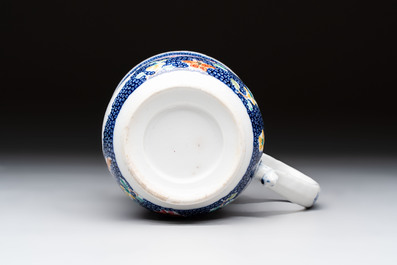 A Chinese Canton famille rose tankard with figural design, Qianlong
