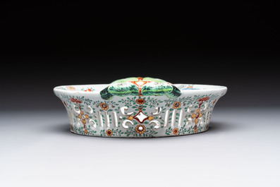 A polychrome Dutch Delft petit feu reticulated basket after a Chinese famille rose example, 18th C.