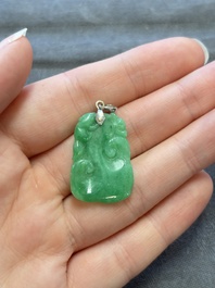 Four Chinese gold- and silver-mounted jadeite pendants, 19/20th C.