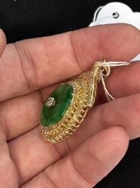 A diamond- and jadeite-inlaid gold pendant, 20th C.