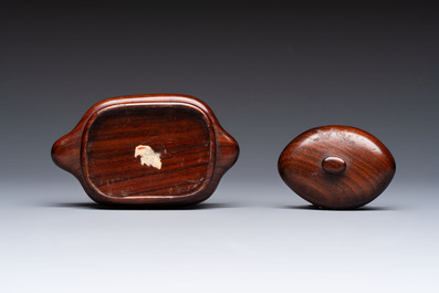 A Chinese famille rose ewer in the form of a dragon and two carps with wooden cover and stand, 19th C.