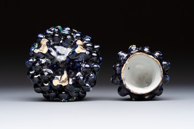 A polychrome Dutch Delft 'Bunch of Grapes' tureen and cover, 18th C.
