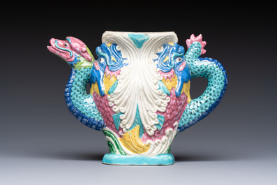 A Chinese famille rose ewer in the form of a dragon and two carps with wooden cover and stand, 19th C.
