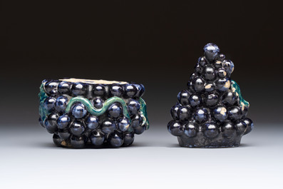 A polychrome Dutch Delft 'Bunch of Grapes' tureen and cover, 18th C.