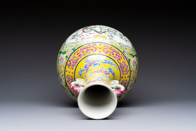 A Chinese famille rose yellow-ground &lsquo;Bats and Peaches&rsquo; bottle vase, Jiaqing/Daoguang