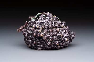 A polychrome Dutch Delft 'Bunch of Grapes' tureen and cover, 18th C.