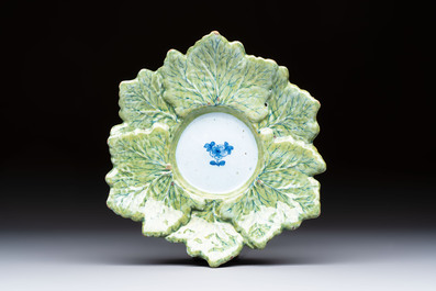 A polychrome Dutch Delft 'Bunch of Grapes' tureen and cover, 18th C.