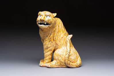 A rare Korean porcelain model of a seated tiger, Joseon, 18/19th C.