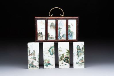 A set of four Chinese famille rose 'Landscape' plaques mounted in a wooden frame, signed Wang Yunquan 王雲泉, together with four plaques, 20th C.