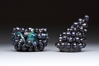 A polychrome Dutch Delft 'Bunch of Grapes' tureen and cover, 18th C.