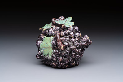 A polychrome Dutch Delft 'Bunch of Grapes' tureen and cover, 18th C.