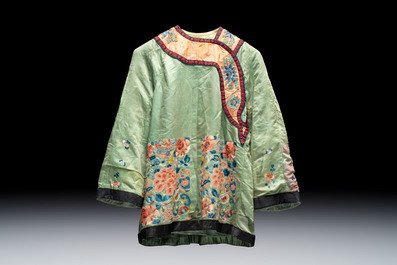 Two Chinese embroidered silk women&rsquo;s robes and an embroidered silk panel, 19th C.