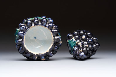 A polychrome Dutch Delft 'Bunch of Grapes' tureen and cover, 18th C.