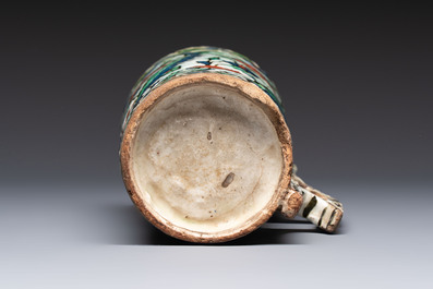 A polychrome Iznik mug, late 16th C.