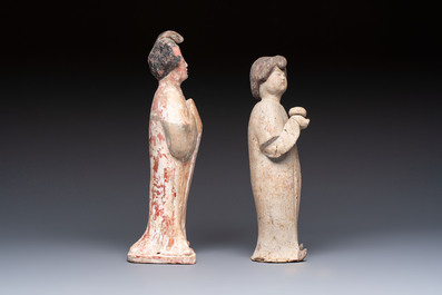 Two Chinese polychrome pottery figures and a female head, Tang
