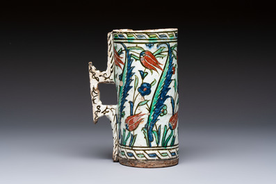 A polychrome Iznik mug, late 16th C.