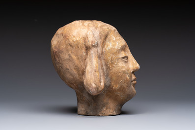 Two Chinese polychrome pottery figures and a female head, Tang