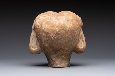 Two Chinese polychrome pottery figures and a female head, Tang